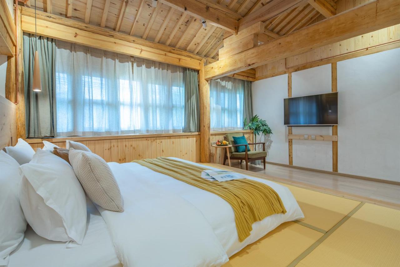 Sushe Inn（2Nd Jianshe Inn) Лицзян Экстерьер фото